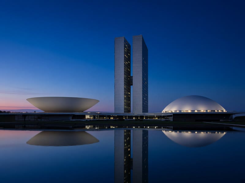 Brazil's National Congress building in Brasília at blue hour.