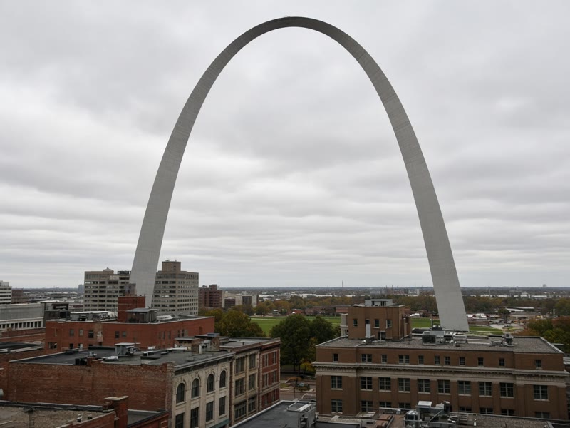 The Gateway Arch above downtown St. Louis rooftops.