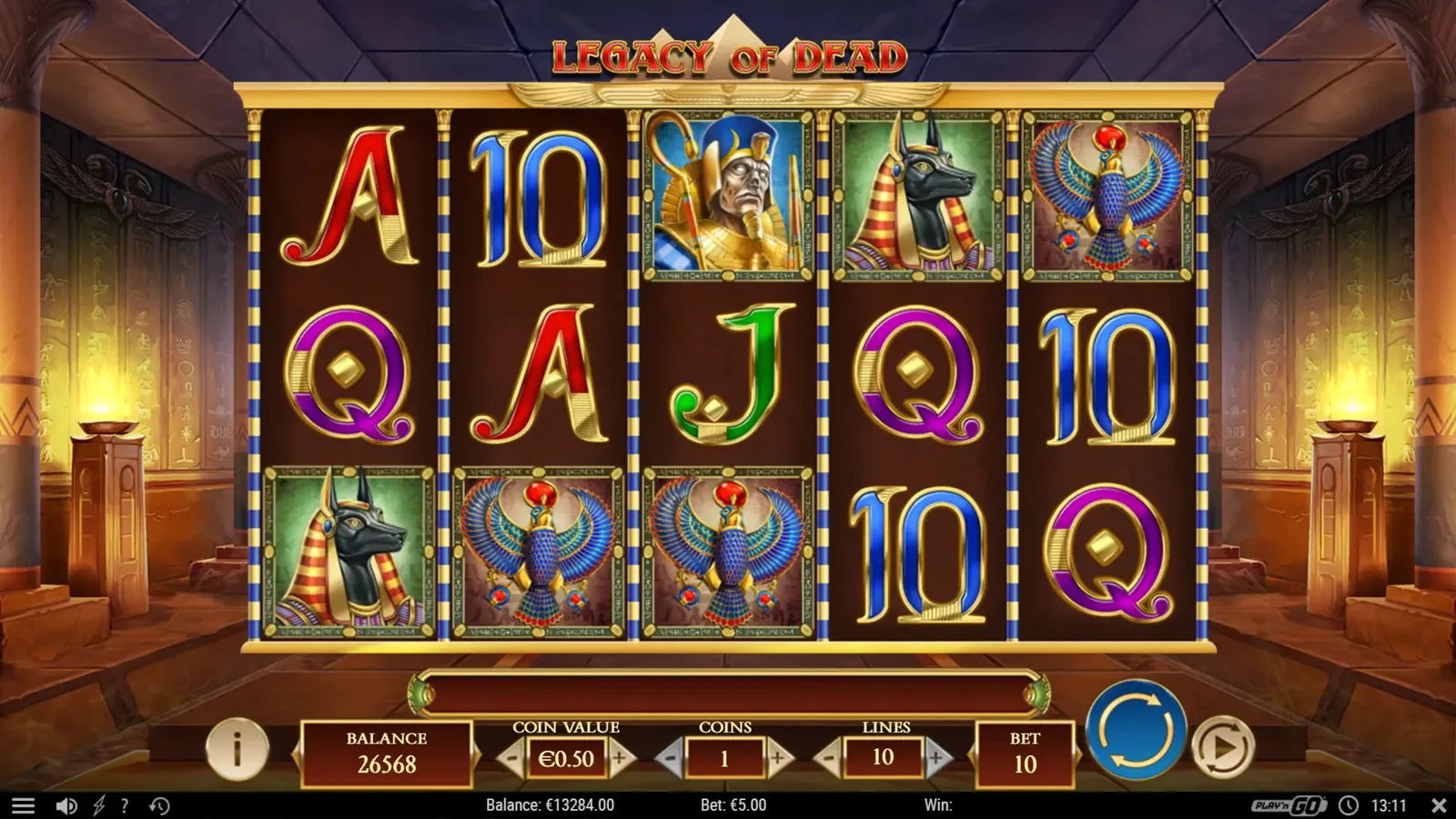 Legacy of Dead slot artwork: official Play’n GO desktop still of the explorer book grid